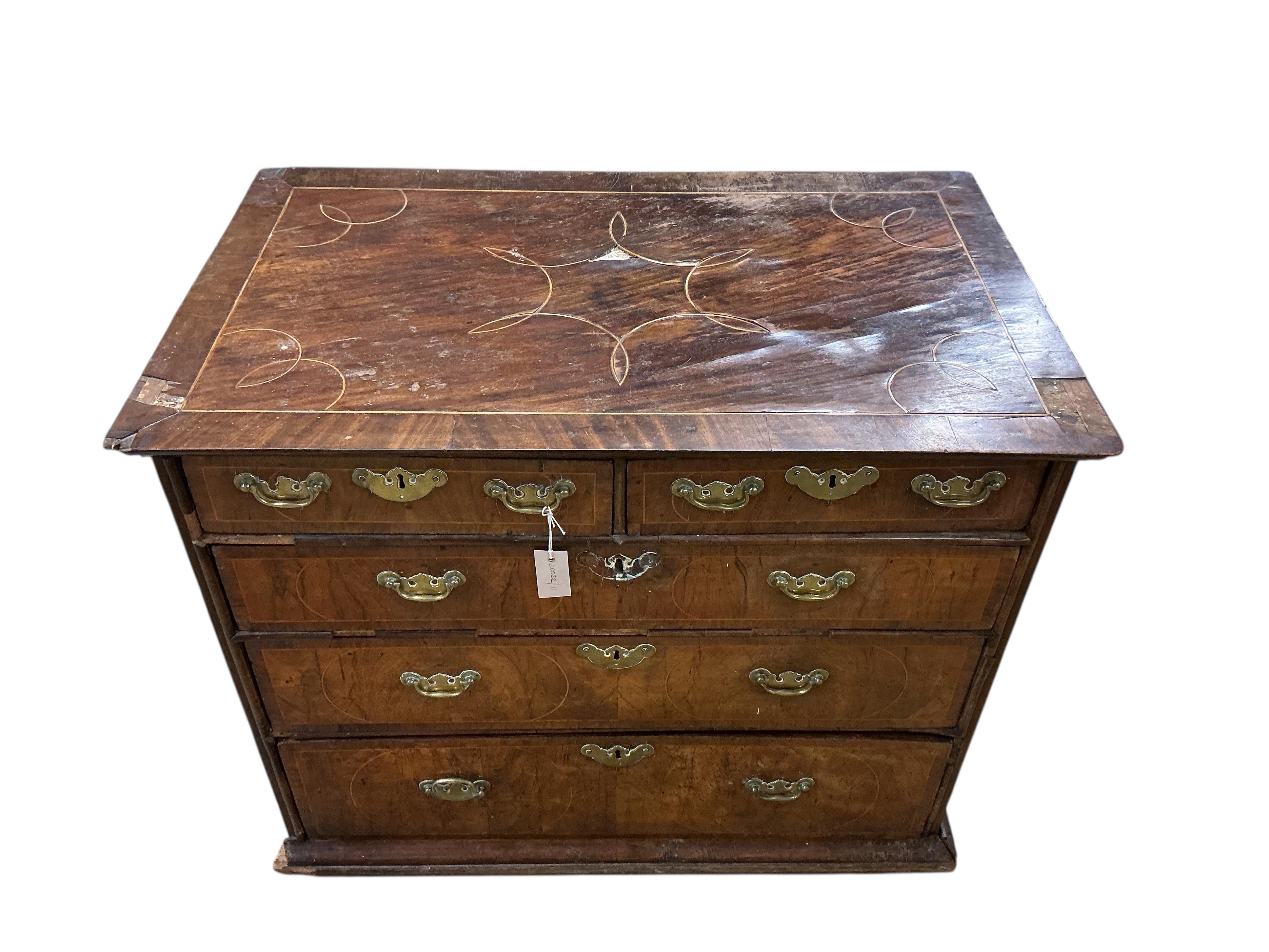 An early 18th century inlaid walnut chest, width 95cm, depth 59cm, height 77cm